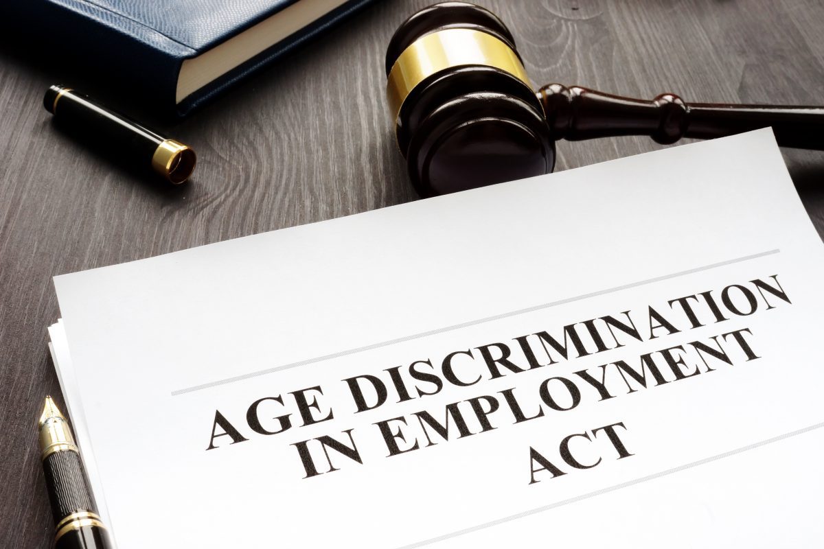 An age discrimination in employment act legal document and gavel representing how our skilled Chicago employment discrimination attorneys can assist you with your case.